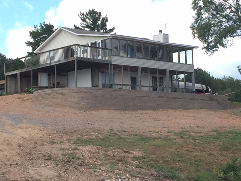 After: Retaining Wall Built As Support For Foundation